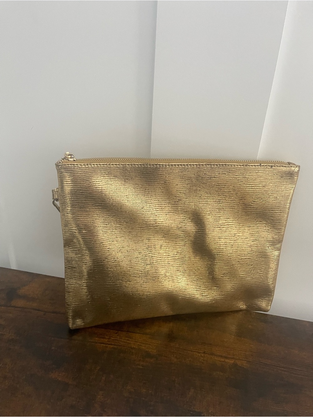 Charming Charlie Metallic Gold Zip Clutch